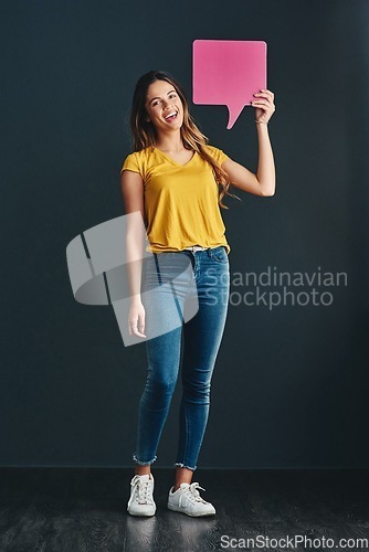 Image of Shes quite the bubbly type. Studio shot of a beautiful young woman holding a speech bubble.