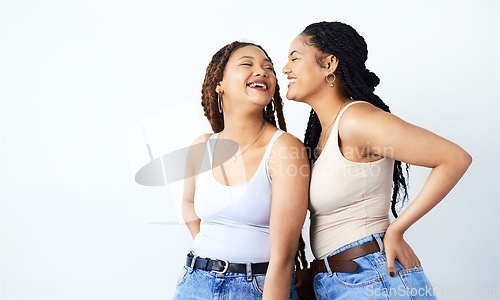 Image of Happiness is beauty. Studio shot of two beautiful young women posing against a grey background.