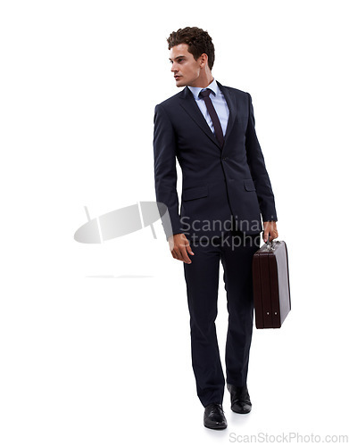 Image of Always on his tiptoes. A young businessman carrying his suitcase.