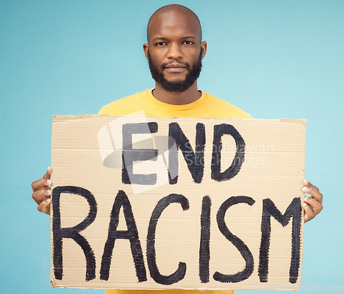 Image of End racism poster, black man and protest isolated on blue background for social justice, change and equality problem. Youth, fight and cardboard sign for human rights, politics and person portrait