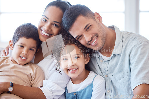 Image of Parents, kids and portrait on couch with smile, hug and together with support, love and care in lounge. Young children, mom and dad on living room sofa for bonding, siblings and relax in family house