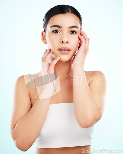 Image of Portrait, skincare and confident woman in studio isolated on a white background. Face, natural beauty and female model with makeup, cosmetics or facial treatment, healthy skin or aesthetic wellness