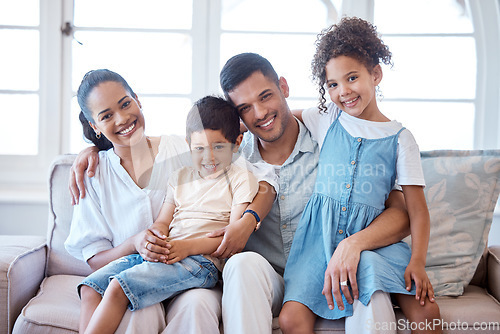 Image of Parents, kids and portrait on sofa with smile, hug and together with support, love and care in lounge. Young family, children and happy on living room couch with bonding, siblings and relax in house