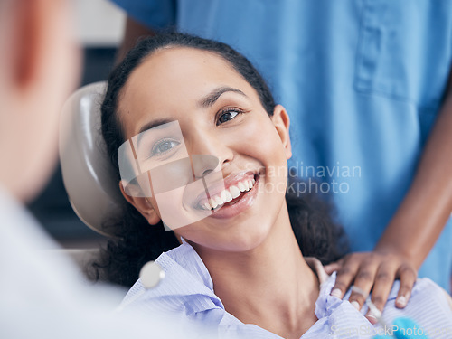 Image of Dentist, healthcare and woman with a smile, checkup and teeth with oral hygiene, treatment and cleaning gum bacteria. Female person, patient and lady with dental care, prevent tooth decay and disease