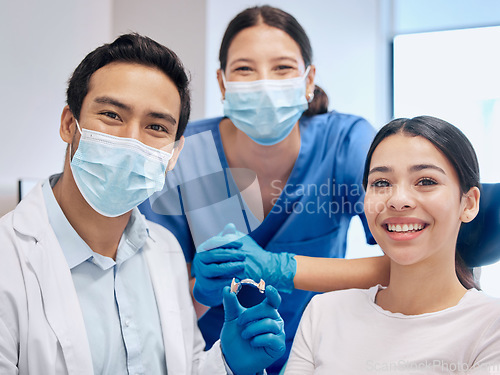 Image of Portrait of dentist and woman with retainer for teeth whitening, service and dental care. Healthcare, dentistry and orthodontist with dentures for patient for oral hygiene, wellness and consulting