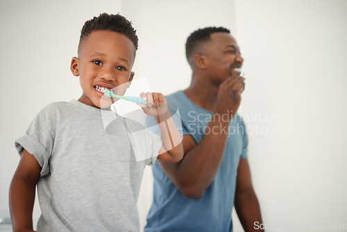 Image of African father, bathroom and brushing teeth with son, care or love for cleaning, hygiene or dental health. Black man, boy and toothbrush in family house for portrait, smile or clean mouth in morning