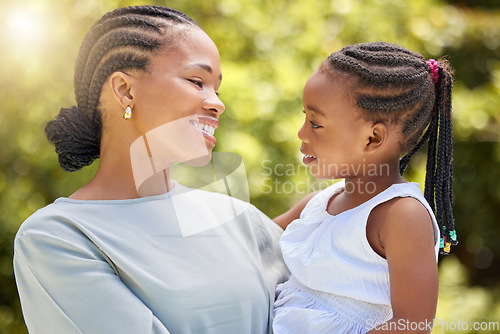 Image of Love, happy and mother with daughter in nature for bonding, free time and smile. Happiness, spring and care with black woman holding young girl in outdoor park for weekend, relax and family