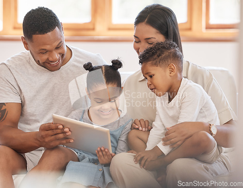 Image of Family, tablet and bonding in home living room, streaming video or cartoons. Technology, smile and kids, father and mother watching film, movie and playing games, elearning and social media together.