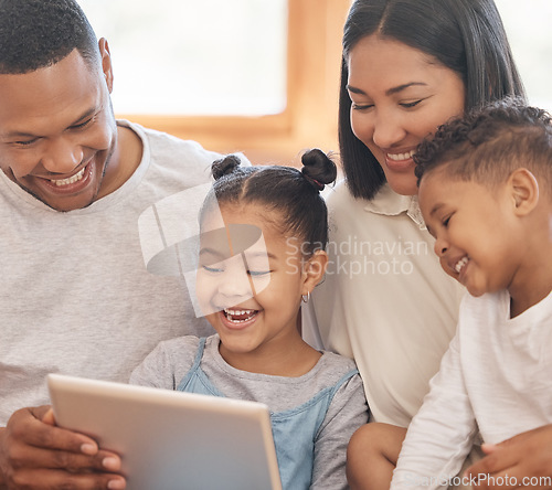 Image of Funny family, tablet and streaming in home living room, bonding and laugh. Technology, smile and kids, father and mother watching comedy film, movie and playing games together, social media or video