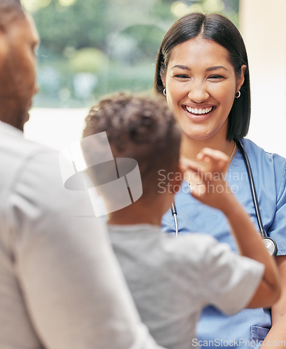 Image of Father, child and nurse for health care in a hospital while happy and talking at consultation. African woman pediatrician, man and kid patient for medical help, family insurance or development check