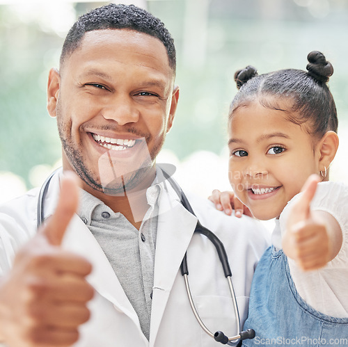 Image of Doctor, child and thumbs up together for health care in hospital with a smile at a consultation. Face of black man or pediatrician and girl patient for medical check, family insurance or development