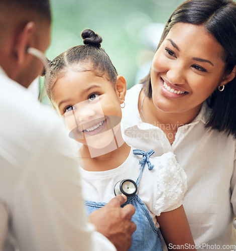 Image of Happy, doctor and mother with girl, healthcare checkup and listen to heartbeat, friendly or consultation. Physician, mama or daughter in the hospital, appointment or stethoscope for diagnosis or care