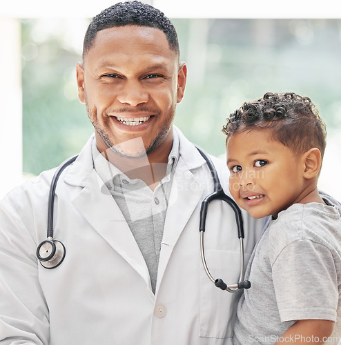 Image of Doctor, child and happy portrait for health care in hospital with a smile at a consultation. Face of black man or pediatrician and kid patient for medical help, family insurance or development check