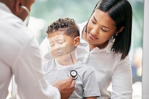 Image of Mother, sick child and doctor with stethoscope for health care in hospital for heart and lungs. African woman, pediatrician man and kid patient cry for medical check, family insurance or development