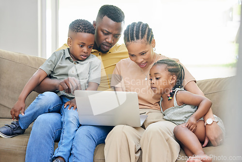 Image of Black family, laptop or education with parents and children bonding on a sofa in the home living room together. Learning, trust or love with a mom, dad and kids streaming an online school video