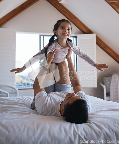 Image of Airplane, fun and happy girl with father on a bed playing, bonding and enjoying the morning indoors. Flying, game and child with parent in a bedroom for creative, fantasy and childhood happiness