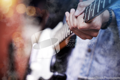 Image of Guitar, rock and man hands at music festival show playing band with electric instrument with lights. Sound, musician and party with live talent and audio for punk event with people at a concert