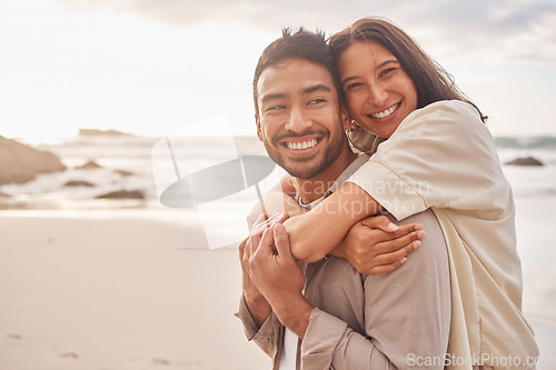 Image of Love, portrait of couple and on the beach happy together with a lens flare. Care or support, summer vacation or holiday break and smile with young people at the sea for a romantic date outdoors