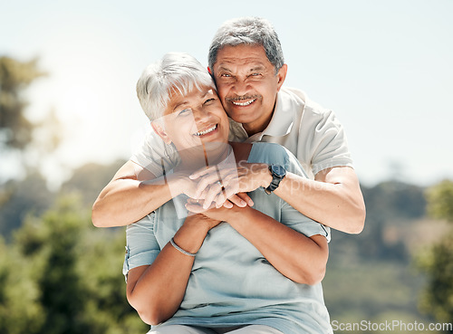 Image of Senior couple, portrait and hug in nature on vacation, holiday or summer bonding. Face, hugging and retirement of man and woman with a smile, love and enjoying romantic time together on mockup space.