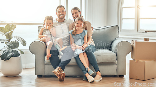 Image of New home, sofa and portrait of parents and children in living room for bonding, quality time and relax together. Happy family, support and mom and dad with girls for care, love and smile in house
