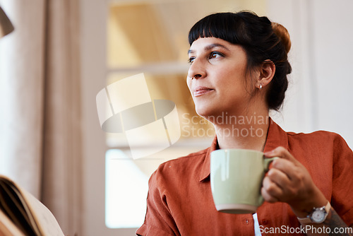 Image of I cant think of a better way to spend the weekend. Shot of an attractive young woman relaxing at home.