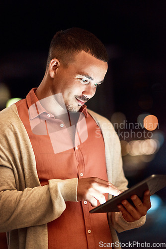 Image of The internet is full of success stories. Cropped shot of a businessman using a digital tablet while standing outside.