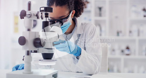 Image of Science, covid and research with woman and microscope in laboratory for expert, medical and planning. Test, vaccine analysis and medicine with female scientist for chemistry, healthcare and pharmacy