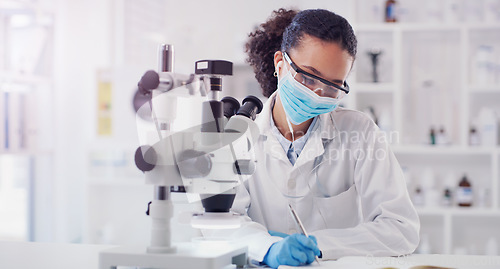 Image of Science, writing and microscope with woman in laboratory for expert research, medical and planning. Covid, vaccine analysis and medicine with female scientist for chemistry, healthcare and pharmacy