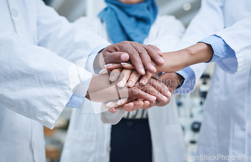 Image of Closeup, hands and group in a hospital, healthcare or scientists with support, motivation or solidarity. Zoom, coworkers or medical professional with teamwork, collaboration or team building in a lab