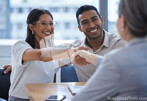 Image of Couple, happy and handshake with financial consultant for deal, agreement or contract. Smile, man and woman shaking hands of broker for finance, loan or mortgage, welcome and thank you for investment