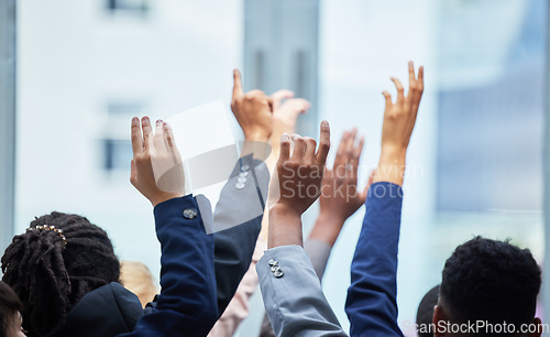Image of Meeting, conference and business people raise hands for speaking at a corporate seminar. Diversity, tradeshow and closeup of group of employees with a question gesture at a convention in the office.