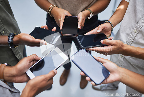 Image of Group, mockup phone screen and circle of people with mobile app, multimedia network and contact from above. Closeup, hands and team with smartphone technology, digital download and sharing UI data