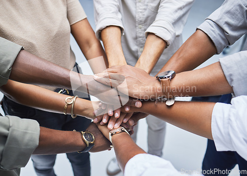 Image of Hands, support and people together for teamwork, solidarity or group collaboration from above. Workforce, diversity and networking in community, business or company staff huddle for team building