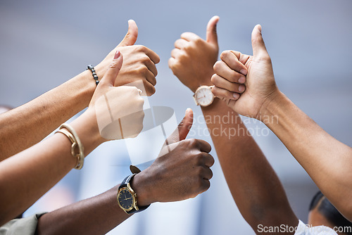 Image of Closeup, people and thumbs up for collaboration, agreement and support of team building achievement. Group, thumb and hands sign for thank you, success and emoji for yes, vote and winning bonus goals