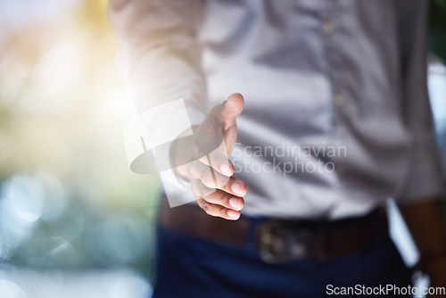 Image of Closeup, man and offer handshake for introduction, meeting and hello for interview, networking and trust. Worker stretching for shaking hands, welcome and thank you for HR agreement of promotion deal