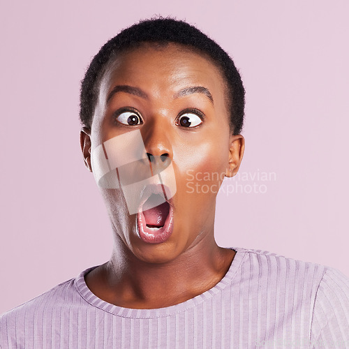 Image of Woman, squinting and portrait in pink studio background with closeup in africa on emoji. Female person, face and squint eyes with funny expression for comedy with goofy girl with joy and humour.