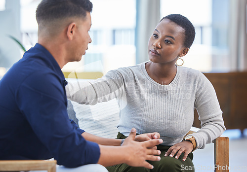 Image of Black woman, office and console man in stress, panic or talking with mental health support in workplace. Professional, businesswoman and care for employee, coworker or management of work pressure