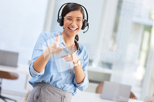 Image of Portrait, call center or woman with gun fingers, telemarketing or excited with promotion. Face, female person or employee with hand gesture, shooting or agent with a smile, tech support or headphones