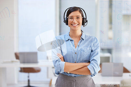 Image of Call center, woman portrait and arms crossed in office for virtual communication, business support or telecom. Happy agent, web advisor or young person in online consulting, agency and advice or chat