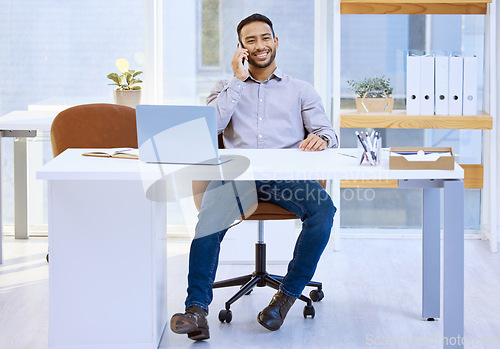 Image of Communication, businessman on smartphone and talking to a customer for support at his desk in a office at workplace. Networking or connectivity, consulting and man on a cellphone at his workspace