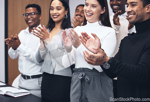 Image of Happy, business people and applause in meeting for presentation, teamwork or collaboration together at office. Hands of group clapping for team motivation, success or corporate goals at the workplace