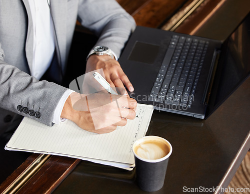 Image of Business man, hands and writing at coffee shop with entrepreneur notes and journal. Schedule planning, morning and list of a freelance employee with a pen working on creative work ideas at cafe
