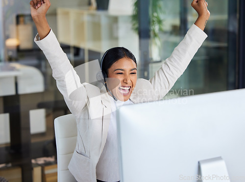 Image of Success, celebration and happy woman at computer in callcenter with good news email or project report. Achievement, winning and excited telemarketing agent in office with bonus feedback and happiness