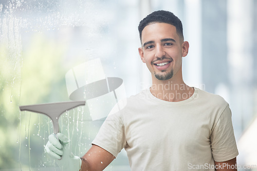 Image of Portrait, happy man and cleaning window on day of for household, hygiene and chores on blurred background. Face, smile and male person with glass cleaner washing surface of his house on the weekend