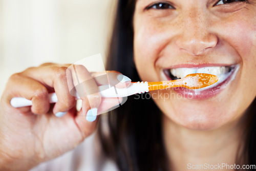 Image of Woman, brushing teeth and smile in portrait, bathroom or cleaning with foam, dental wellness and morning. Girl, toothbrush and product for mouth, gums and health with routine, self care and happiness