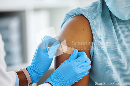 Image of Healthcare, doctor with plaster on a patient arm and in a hospital room. Medicine treatment or safety care, surgeon with scrubs and nurse with medical aid kit with a person at a clinic for wellness