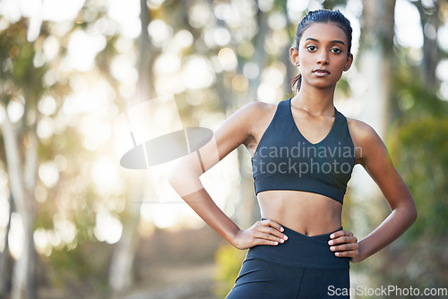 Image of Portrait, forest and woman with fitness, training and workout goal with wellness, confident and progress. Face, female person and athlete outdoor, performance and sports with endurance and exercise