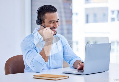 Image of Call center, laptop and man, agent or consultant talking, typing and technical support, advice or service in office. Happy web advisor, callcenter worker or asian person speaking or help on computer