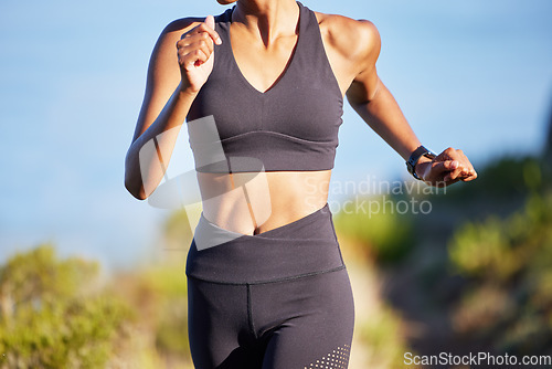 Image of Woman, body and running outdoor for fitness and cardio in nature with exercise and healthy, active lifestyle. Closeup of female runner in park, abdomen and train for marathon with workout and health