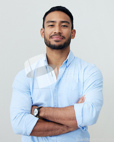 Image of Accountant, portrait and business man with arms crossed in studio isolated on white background. Face, confidence and Asian male professional, entrepreneur or auditor from Singapore with career pride.